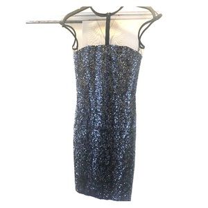 Black low back sequin dress with mesh top and back